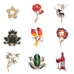 Papegaaien - libel - kikker - bloem - ballerina - kristallen brocheBroches