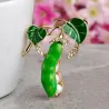 Groene erwten met parels - kristallen brocheBroches