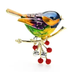 Een vogel zittend op een tak - kristallen brocheBroches