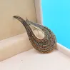 U-vormige broche - met kristallen versieringenBroches