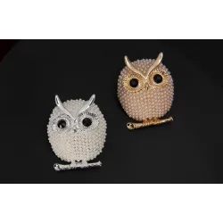 Kristallen broche met pareluilBroches