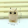Kristallen broche met pareluilBroches
