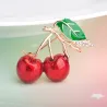 Elegant brooch with a red crystal cherryBrooches