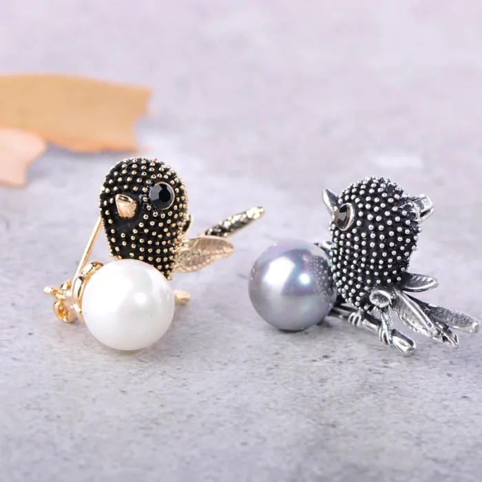 Vintage vogel broche met parelBroches