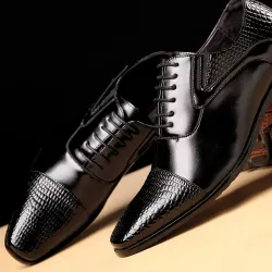 Elegante leren platte schoenen - slangenleer patroon - met vetersSchoenen