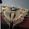 Vintage broche met kristallen vlinderBroches
