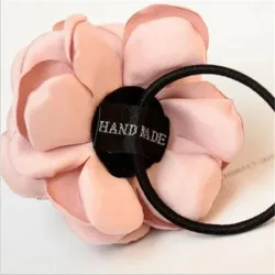 Elegante elastische haarband - met grote roosHaarspelden