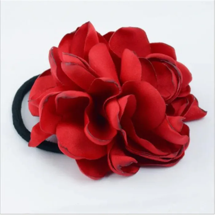 Elegante elastische haarband - met grote roosHaarspelden