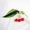 Groen blad / 3 kersen - elegante brocheBroches