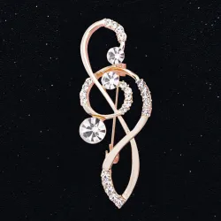 Luxurious gold brooch - with crystal music noteBrooches