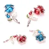 Luxurious brooch with double crystal roseBrooches