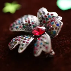 Broche met kristallen narcissen - veelkleurige strass steentjesBroches