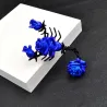 Scorpion shaped brooch with rosesBrooches