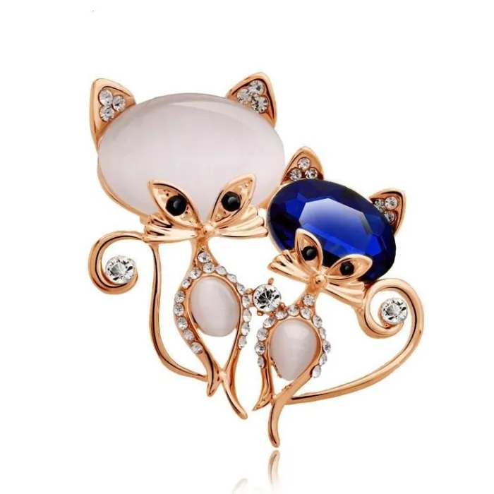Broche met twee kristallen vossenBroches