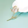 Elegante broche met opaal / kristallen tulpBroches