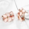 Oorknopjes in de vorm van een bloem - met veelkleurige zirkoon - roségoudOorbellen