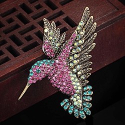 Luxurious vintage brooch with crystal hummingbird