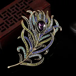 Vintage veervormige broche met kristallenBroches