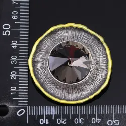 Antiek zilveren ronde broche - met kristalBroches