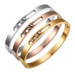 Elegant bracelet for women - shining crystals - sliding clasp - gold / silver / rose in colour
