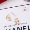 Flower shaped stud earrings - with crystals / pearlsEarrings