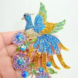 Modieuze broche - met kleurrijke kristallen pauwBroches