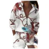 Modieuze tweedelig jumpsuit - met ritssluiting - top met lange mouwen / shorts - vlinders / letters / blaadjes bedruktJumpsuits