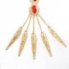 Vijfvingerring - met ketting - gouden armband - uitgeholde bloemen / rode kristallenArmbanden