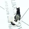 Trendy emaille broche - wit/zwart dubbele kat - pinBroches