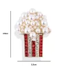Parelpopcorn broche - met strass steentjesBroches