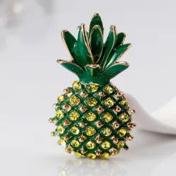 Elegante broche met groene kristalananasBroches