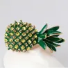 Elegante broche met groene kristalananasBroches