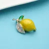 Trendy broche met gele citroen / kristallenBroches