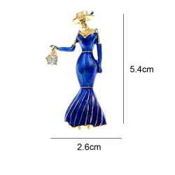 Fashionable brooch - a woman in a blue dress with a crystal handbagBrooches