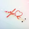 Medische broche - elektrocardiogram / stethoscoop / hart - met kristalBroches