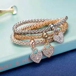 Elegante driedelige armband - met kristallen hartjes - zilver - goud - roségoudArmbanden
