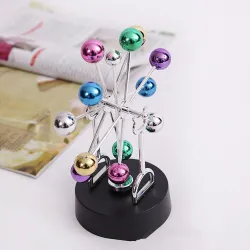 Kleurrijk roterend reuzenrad - Newton Pendulum ballMagneten