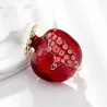Elegante broche met rode granaatappelBroches