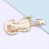 Stijlvolle broche met gitaar & kristallen vlinderBroches
