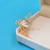 Modieuze gouden broche - met parelbij & kristallenBroches