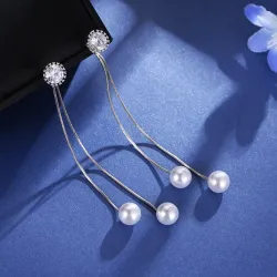 Elegante lange oorbellen met parels / kristalOorbellen