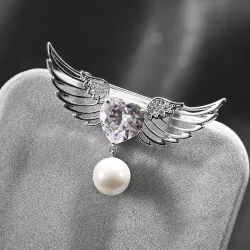 Luxe broche - engelenvleugels - kristallen hart - parelBroches