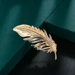Golden feather brooch - with crystalsBrooches