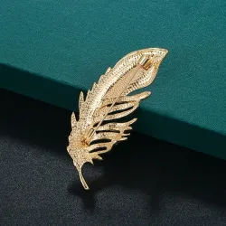Golden feather brooch - with crystalsBrooches