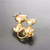 Double cat with crown - broochBrooches
