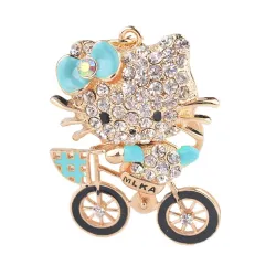 Crystal kitten op een fiets - sleutelhangerSleutelhangers