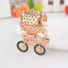 Crystal kitten op een fiets - sleutelhangerSleutelhangers