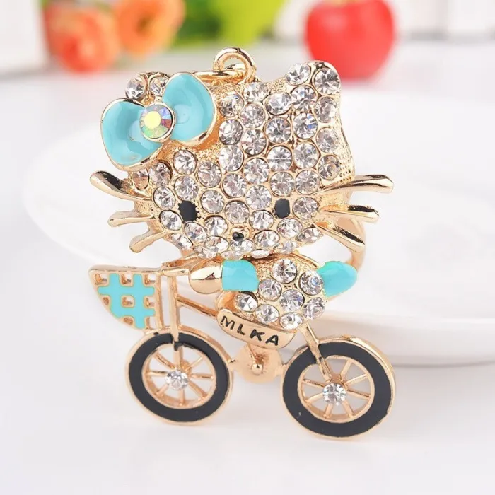 Crystal kitten op een fiets - sleutelhangerSleutelhangers