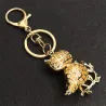 Gouden kristallen uil - groene bladeren - sleutelhangerSleutelhangers