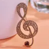 Large crystal music note - vintage broochBrooches